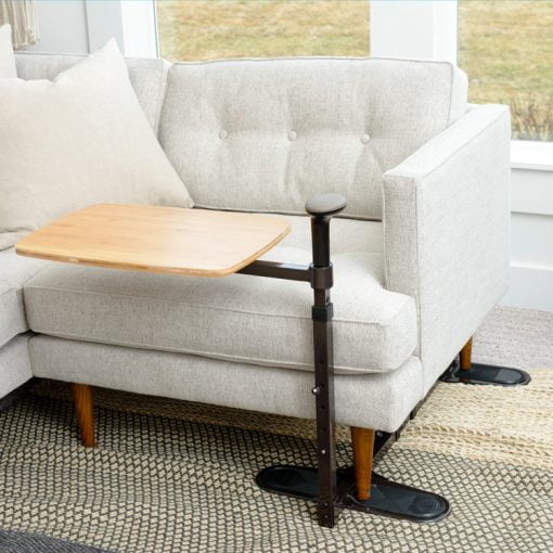 Laptop tray table against a sofa