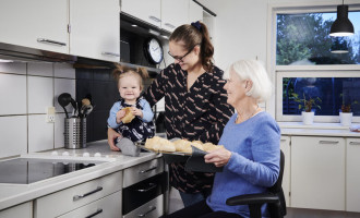 Vela Tango 700E mobility chair being used in the kitchen